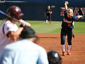 Arizona ace Taryne Mowatt, right, prepares to fire during the Wildcats 4-3 loss to Texas A&M Feb. 24. With injuries starting to take their toll on her teammates, the righty has had to step up even more.