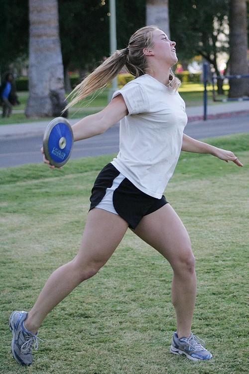 Colleen Tighe Biology Sophomore throws a discus as part of an extra curricular competition held by an Ancient sports class.  