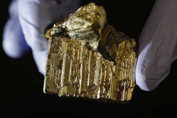 A specimen of natural pyrite found in the earth is photographed in the lab of Matt Law, assistant professor, Department of Chemistry at University of California, Irvine, November 9, 2010. Investigators at UCI are trying to develop pyrite solar cells made from nanocrystal inks.