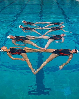 The Arizona club synchronized swimming team practices its routine Sunday in the Student Recreation Center pool. The squad takes to the pool against Division I defending national champ Stanford this weekend at the Rec Center.