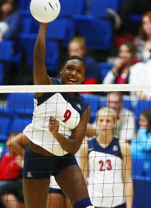 UA outside hitter Tiffany Owens swats the ball in a 3-0 loss to Stanford in McKale Center on Saturday. The Wildcats will try to snap a five-match losing streak on the road this weekend against USC and UCLA. 