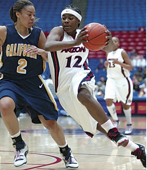 UA guard Ashley Whisonant drives down the court in an 84-64 loss to California on Jan. 27 in McKale Center. The senior and the rest of the Wildcats will open their season at home tonight against Portland. 