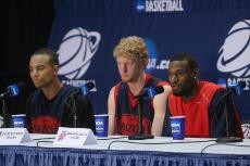 UA guard Jawann McClellan speaks, while forward Chase Budinger and guard Jerryd Bayless look on, at a press conference during Wednesdays Media Day in the Verizon Center in Washington D.C.