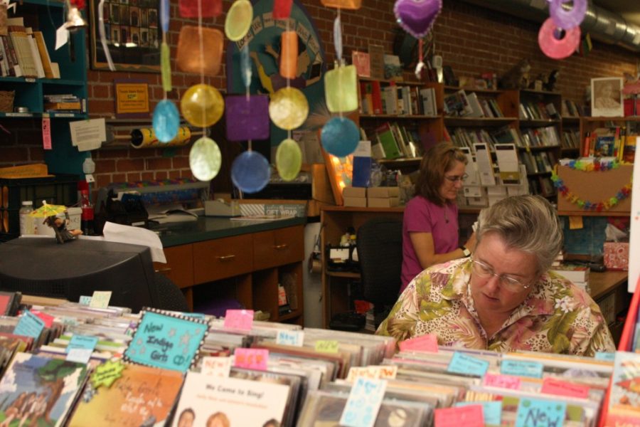 Karen Soper browses through cards at Antigone Books on 4th Avenue on Tuesday, Sept. 1. She visits the bookstore a couple times a year when she visits from Green Valley.