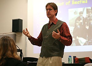 Music 109 professor Brian Moon lectures on the history of The Beatles during his class in the Music building 