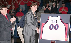 Arizona womens basketball head coach Joan Bonvicini unveils Polks framed jersey with President Peter Likins. Polk was remembered in a short ceremony Saturday in McKale Center.
