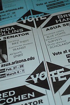 ASUA candidates began hanging posters all over campus yesterday, marking the first day of campaigning. The posters this year spell out the word vote when connected.