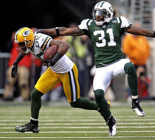 Greg Jennings of the Green Bay Packers makes a catch as he was defended by New York Jets player Antonio Cromartie. The Packers defeated the Jets, 9-0, at The New Meadowlands Stadium in East Rutherford, New Jersey, Sunday October 31, 2010. (Tom Lynn/Milwaukee Journal Sentinel/MCT)