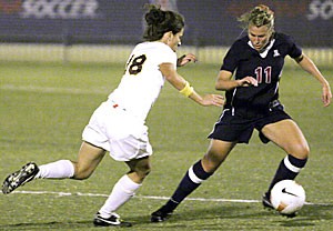 UA defender Kaity Heath fights off ASU defender Lauren Niblett in a 2-1 loss to the Sun Devils on Friday night at Murphey Stadium. The Wildcats suffered many scoreless droughts and goalkeeper injuries this season.