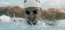 UA simmer Jack Brown powers through a stroke during a Wildcat dual-meet win against California on Jan. 23 at the Hillenbrand Aquatics Center. The swim teams head to Texas this weekend for a dual meet against Texas and Southern Methodist University.