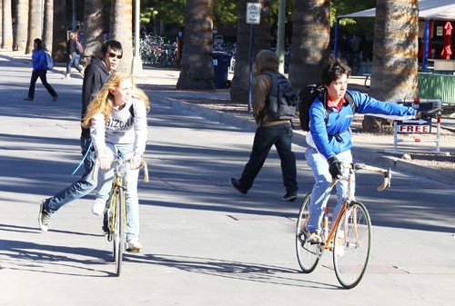 Gordon Bates / Arizona Daily Wildcat

Cyclists on the mall navigate through the slower moving pedestrian and board riding traffic Monday, Oct 29.  Bicycles are the fastest moving student vehicles on campus, so their defensive riding has a large impact on the level of safety for everybody.