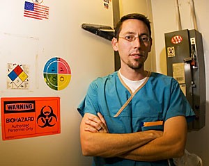 Dr. Don Christensen, chief resident of patholgy at University Medical Center, works with a team of pathologists and performs several duties within the UMC morgue.