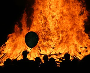 Students and alumni gathered for the annual Homecoming bonfire on the UA Mall Friday night. The bonfire was accompanied by fireworks and music from the Pride of Arizona marching band.