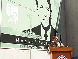 Former President Peter Likins speaks at the dedication of a mural to former President Manuel Pacheco at the Manuel T. Pacheco Integrated Learning Center Sunday morning.