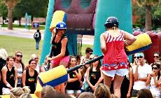 Two sorority girls duke it out in the annual War of the Roses in September.