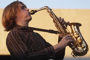 UA Jazz Ensemble member Jeff Siegfried performs on his saxophone outside the Music Building.