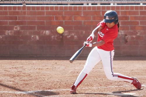 Outfielder Brittany Lastrapes takes a swing during Arizona?s opening fall softball game, a 12-0 win against the Yavapai College Roughriders on Sunday. Lastrapes and her teammates hope to build team chemistry as they continue play in five games this weekend.