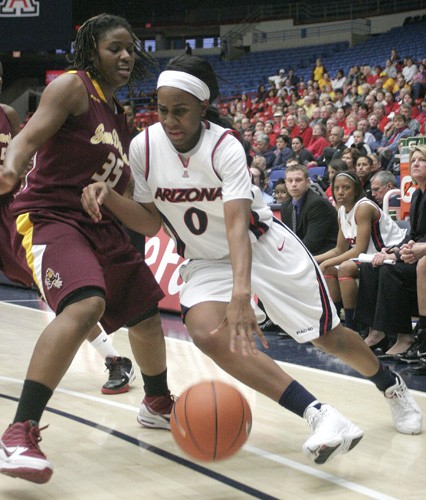 Freshman guard Davellyn Whyte drives the baseline in the Wildcats? 73-67 loss to ASU in McKale Center on Sunday. Arizona women?s basketball has now dropped nine-straight games to the Sun Devils. 