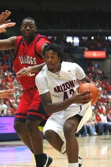UA forward Jordan Hill cradles the ball during Arizonas 69-50 win over Fresno State Dec. 16 in McKale Center. Hill averages 13.4 points and a team-high 7.3 rebounds per game.