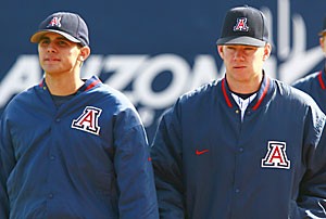 Arizona starters Brad Mills, left, and Preston Guilmet walk off the field after Arizonas 7-5 loss to Eastern Michigan March 4 at Sancet Stadium. The duo have been an anchor for the Wildcats all season, ranking among the top in the Pacific 10 Conference when it comes to Friday and Saturday starters.