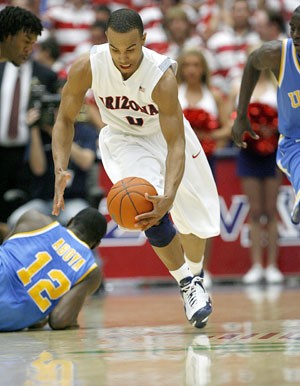 Arizona guard Jerryd Bayless goes for a loose ball in the Wildcats 68-66 loss to UCLA on Mar. 2. Bayless was one of 24 players named to the John Wooden Award, an annual honor for national college basketball player of the year.