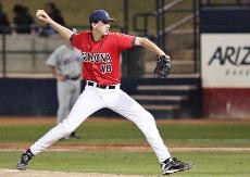 UA pitcher Kyle Simon prepares to fire a pitch toward home plate during an 8-1 Arizona win against Holy Cross Wednesday night at Sancet Stadium. The Wildcats swept the two-game series against the Crusaders by the combined score of 23-5. 