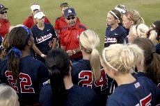 Arizona head coach Mike Candrea preps his players before a 10-inning win over Tennessee in Game 2 of the Womens College World Series June 5. Candrea and his fellow coaches have been named the NCAA Division I staff of the year by the National Fastpitch Coaches Association.
