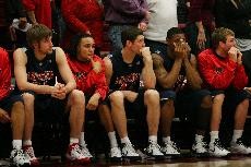 From left to right, Arizona players Kirk Walters, Daniel Dillon, Bret Brielmaier, Fendi Onobun, and Zane Johnson watch as Stanford closes out its 56-52 win over the Wildcats Thursday in Maples Pavilion. The bench played just 30 minutes, as four of Arizonas starters played at least 35.