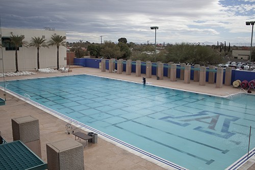 Janice Biancavilla / Arizona Daily Wildcat

A worker continues preparations Friday for the Recreation center swimming pool to reopen today for student use. The newly resurfaced pool now has a large UA logo on the bottom.



