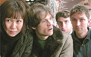 Deerhoof, an experimental rock back from California, may look normal in this photo, but they really arent. In addition to performing in orange bear suits in the past, they also claim to be influenced by Radiohead.