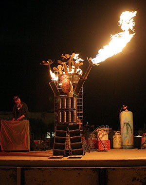 Flam Chen, Tucsons favorite pyrotechnic artists, send up a mighty flare into the desert sky at Day of the Dead in this Nov. 5, 2007 file photo. Flam Chen will be performing at Ms. Spyders Combustible Tea Party this Saturday. 