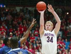 Arizona forward Chase Budinger lines up a 3-pointer during the Wildcats 106-97 win against No. 23 Washington Thursday night in McKale Center. Budinger hit three 3s in the game including some crucial makes in the second half to help Arizona fight off the Huskies comeback bid.