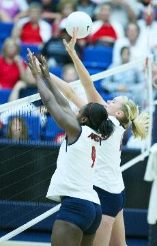 Outside hitter Tiffany Owens, left, and middle blocker Jacy Norton leap for a block during a 3-0 win over San Jose State in McKale Center last Friday. The Wildcats look to clean up their play in this weekends Arizona Invitational tournament in McKale Center.