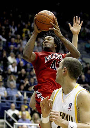 Arizona forward Jordan Hill lunges to the basket in the Wildcats 79-75 win at California on Jan. 19. The 6-foot-10 Hill will be going up against a large Golden Bear lineup. 