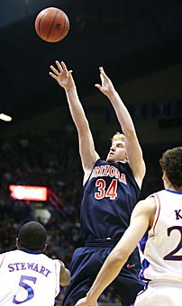 UA forward Chase Budinger attempts a jumper during Arizonas 76-72 overtime loss Sunday at No. 4 Kansas. Texas A&M head coach Mark Turgeon was impressed with Budingers 27-point performance with Kansas defender Brandon Rush guarding him much of the game.