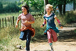 Josh Hutcherson, left, and AnnaSophia Robb, right, star in Walt Disneys film production of Bridge to Terabithia. The film follows the two friends as they create a fantasy world to escape the real worlds harsh realities. They also like to run around and dress in Hot Topic punk outfits from 1997.