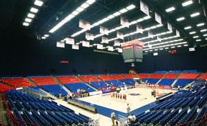 The new retractable curtain, shown in McKale Center before a 10 a.m. game against Weber State last Friday, cuts the seating in the arena from 14,525 down to 4,181 for a more intimate setting. 