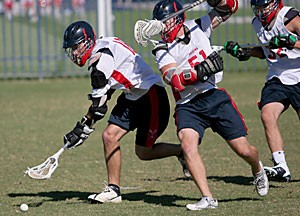 Freshman attack Corey Smith (left) and teammates on the Arizona club lacrosse team pursue the ball during practice at Rincon Vista Complex. The Laxcats won two out of three games in the Best of the West Tournament in Las Vegas but had to settle for playing in the losers bracket after an opening loss to Utah.  
