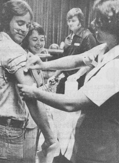 Dee Morse, a natural resource recreation student was one of about 2,200 persons who received flu vaccinations at the University Wednesday October 20, 1976