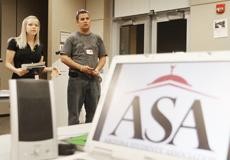 Left, Nicole Pasteur and Brandon Bymers, ASA Intern Board members, discuss the state-wide education budget cuts and plan their lobbying efforts to fight them as part of the Arizona Students Association meeting in the SUMC on Thursday. 