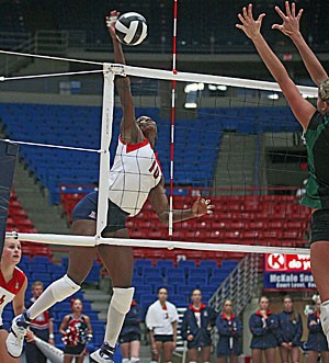 Junior Dominique Lamb connects on a right-handed spike Aug. 26 against San Francisco in McKale Center. The Wildcats play their first Pacific 10 Conference opponent today when they face ASU. 