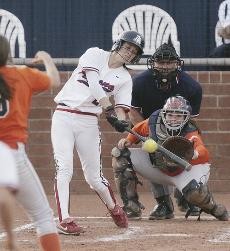 UA catcher Stacie Chambers blasts a home run during a 20-1 win against UTEP on Wednesday at Hillenbrand Stadium. The Wildcats swept the Miners in a doubleheader by the combined score of 25-3 in 12 innings of play