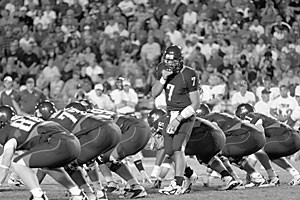 Sophomore quarterback Willie Tuitama shouts out the signals to his offensive linemen in Octobers loss to Oregon at Arizona Stadium. The lines future looks bright after three freshmen redshirted, got stronger and learned the system, including starting right tackle Eben Britton.