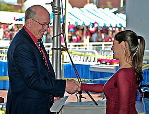 Computer science senior Ekaterina Spriggs is congratulated by Provost George Davis for her award-winning project. More than 100 graduate and undergraduate students participated in the showcase Friday and Saturday.