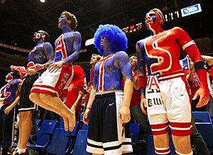 Michael Biegelman (right) is one of the many Zona Zoo fans who paint themselves before home games. Biegelman is one of the founding members of the Zona Screw--a flier which is passed out before home games. (Photo by Chris Coduto/Arizona Daily Wildcat)