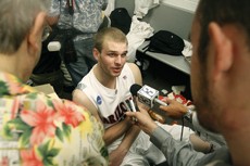 UA wing Zane Johnson talks with the media after a 84-71 Arizona win against Utah on March 20 at AmericanAirlines Arena in Miami.