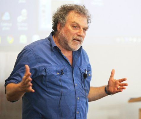 Mike Christy / Arizona Daily Wildcat

Composer Martin Bresnick speaks to a crowd of about 40 people Monday, Nov. 15, 2010, at the UA Poetry Center in Tucson, Ariz. Bresnick spoke on his concerto "Caprichos Enfaticos" which is based on Francisco Goya's "Desastres de la guerra".