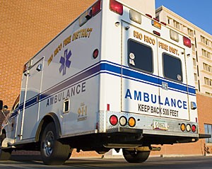An ambulance waits outside the University Medical Center yesterday afternoon.  A new program sponsored by the UMC and the Tucson Fire Department seeks to transmit vital patient information from the ambulance to the awaiting emergency room.