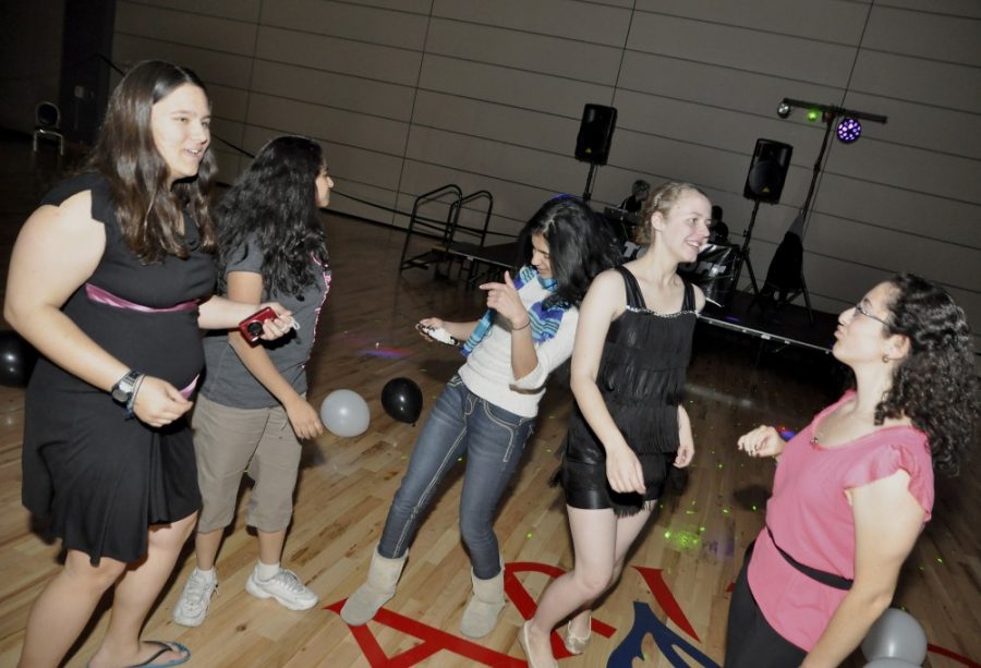 Alex Kulpinski / Daily Wildcat

University of Arizona students dance the night away at the Honors Student Council Dance for a Cause even last Friday night.  The theme of the dance was It Used to be Cool and was designed to help give back to the community. 