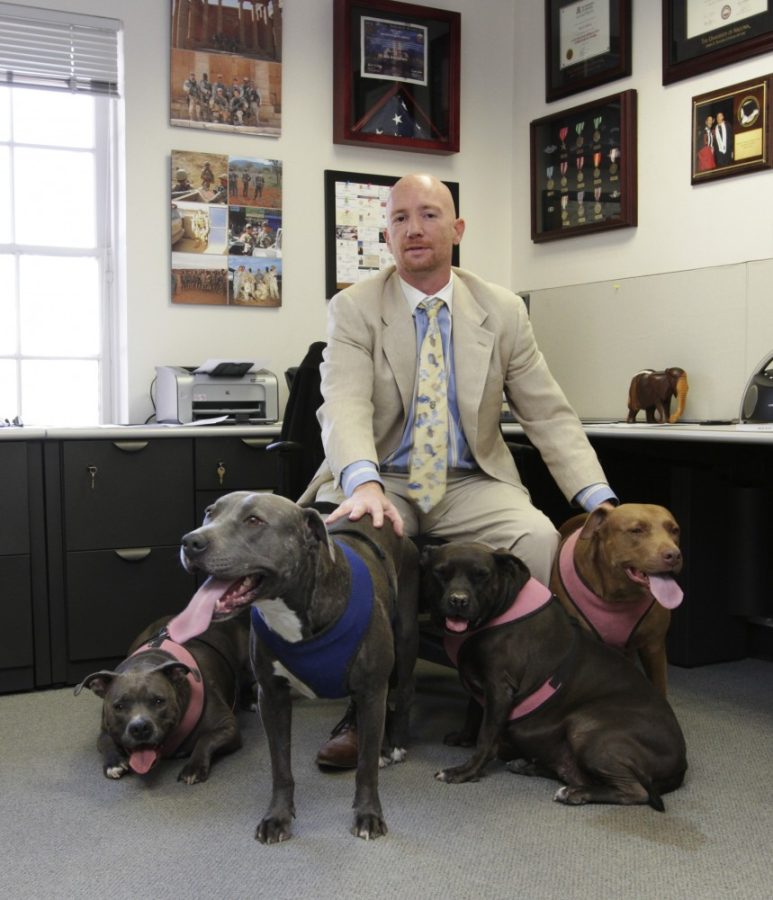 Gordon+Bates+%2F+Arizona+Daily+Wildcat%0A%0AAs+part+of+Tough+Love+Pitbull+Rescue%2C+Kris+Calson%2C+a+UA+law+graduate%2C+rescues+pitbulls+from+the+pound+during+the+final+24+hours+before+they+are+scheduled+to+be+put+down.+Tough+Love+is+a+pit+bull+adoption+organization+that+is+run+by+Kris+and+just+over+a+half+a+dozen+other+volnteers%2C+several+of+which+are+UA+graduates+or+students.+
